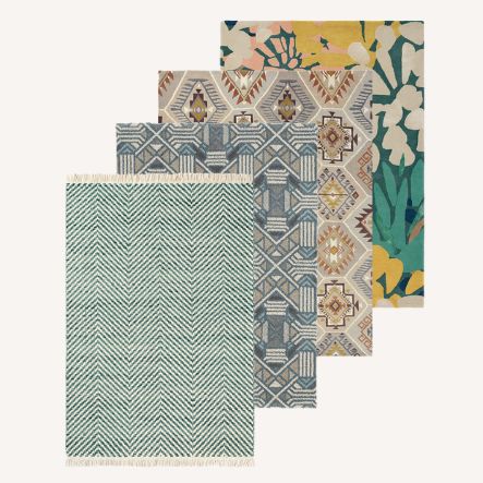 Four Brink and Campman designer rugs including a green herringbone, blue geometric and bold floral design