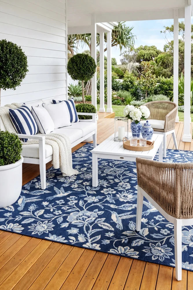 Seaside 7777 Navy Rug — styled outdoor setting