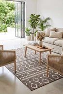 Alaska Indoor Outdoor 33 Brown Rug — styled indoor setting