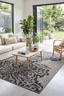 Alaska Indoor Outdoor 05 Brown Black Rug — styled indoor setting