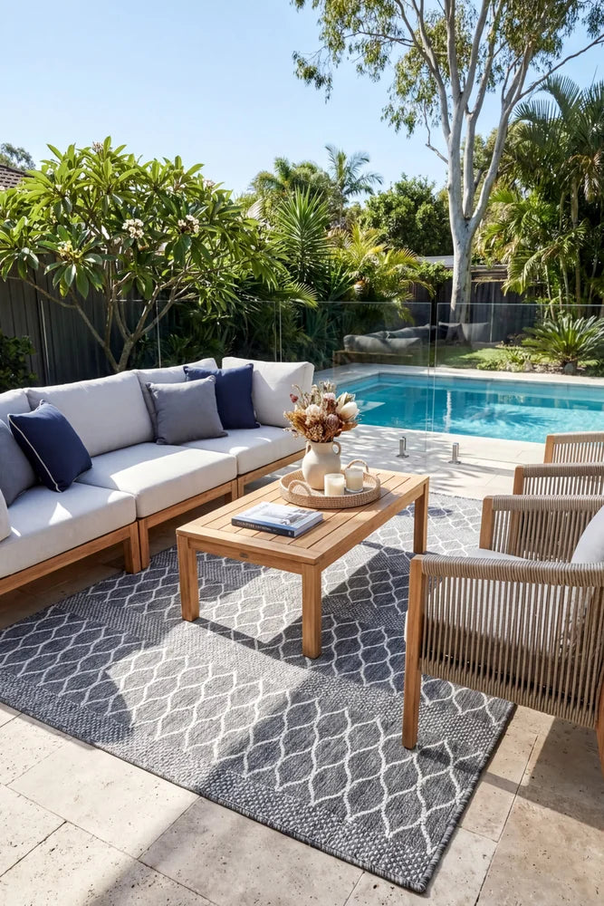 Alaska Indoor Outdoor 26 Grey Rug — styled outdoor setting