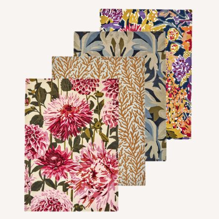 Harlequin designer rugs with bold botanical prints including pink dahlias and coral motifs