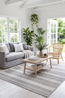 Alma 25 Grey Outdoor Rug — styled indoor setting