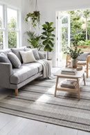 Alma 25 Beige Outdoor Rug — styled indoor setting