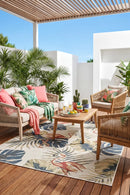 Montana Flamingo Outdoor Rug — styled outdoor setting