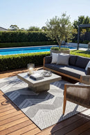 Colorado Waves Outdoor Rug — styled outdoor setting