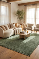 Conscious Loom Kinship Sage Green Rug — AI styled visualisation