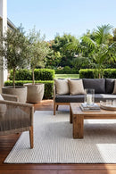 Denver Grey & Ivory Indoor Outdoor Rug — styled outdoor setting