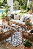 Eden Black & White Reversible Outdoor Rug — AI styled visualisation