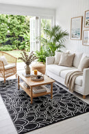 Eden Black & White Reversible Outdoor Rug — styled indoor setting