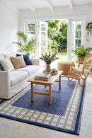 Europa Blue Reversible Outdoor Rug — styled indoor setting