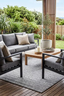 Nevada 508 Indoor Outdoor Grey Rug — styled outdoor setting