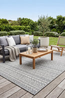 Nevada 302 Indoor Outdoor Grey Rug — styled outdoor setting