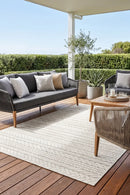 Nevada 608 Indoor Outdoor Cream Rug — styled outdoor setting