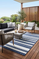 Nevada 994 Indoor Outdoor Blue White Rug — styled outdoor setting