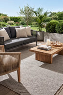 Herringbone Ash Grey Indoor Outdoor Rug — styled outdoor setting