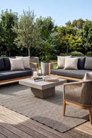 Herringbone Black Indoor Outdoor Rug — styled outdoor setting