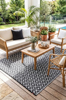 Kimberley Black Reversible Outdoor Rug — AI styled visualisation