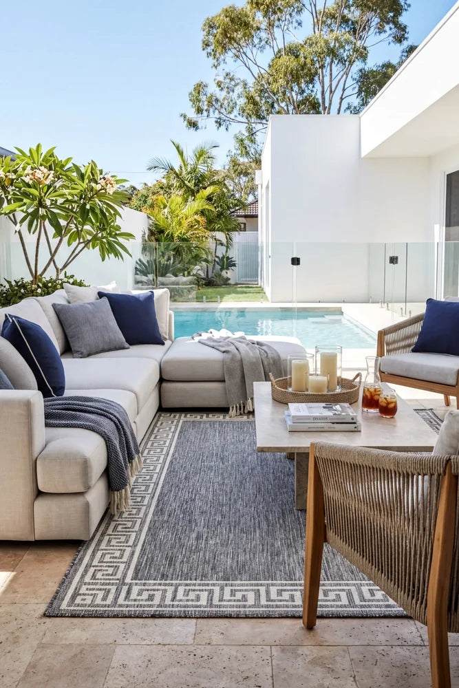 Alaska Indoor Outdoor 81 Light Grey Rug — styled outdoor setting