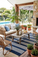 Mariona Blue Outdoor Rug — AI styled visualisation