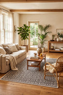 Moti Black & White Outdoor Rug — styled indoor setting