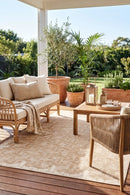 Patio Kudo Natural Indoor Outdoor Rug — styled outdoor setting