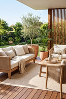 Patio Misty Natural Indoor Outdoor Rug — styled outdoor setting