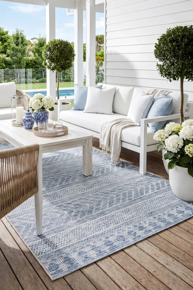 Terrace 5505 Blue Rug — styled outdoor setting