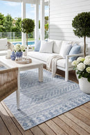 Terrace 5505 Blue Rug — styled outdoor setting