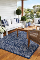 Seaside 5555 Navy Rug — styled outdoor setting