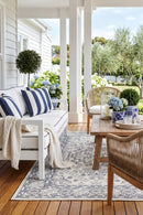 Seaside 5555 White Rug — styled outdoor setting