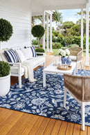 Seaside 7777 Navy Rug — styled outdoor setting