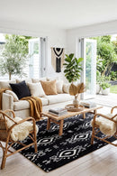 Surah Black Indoor Outdoor Rug — AI styled visualisation
